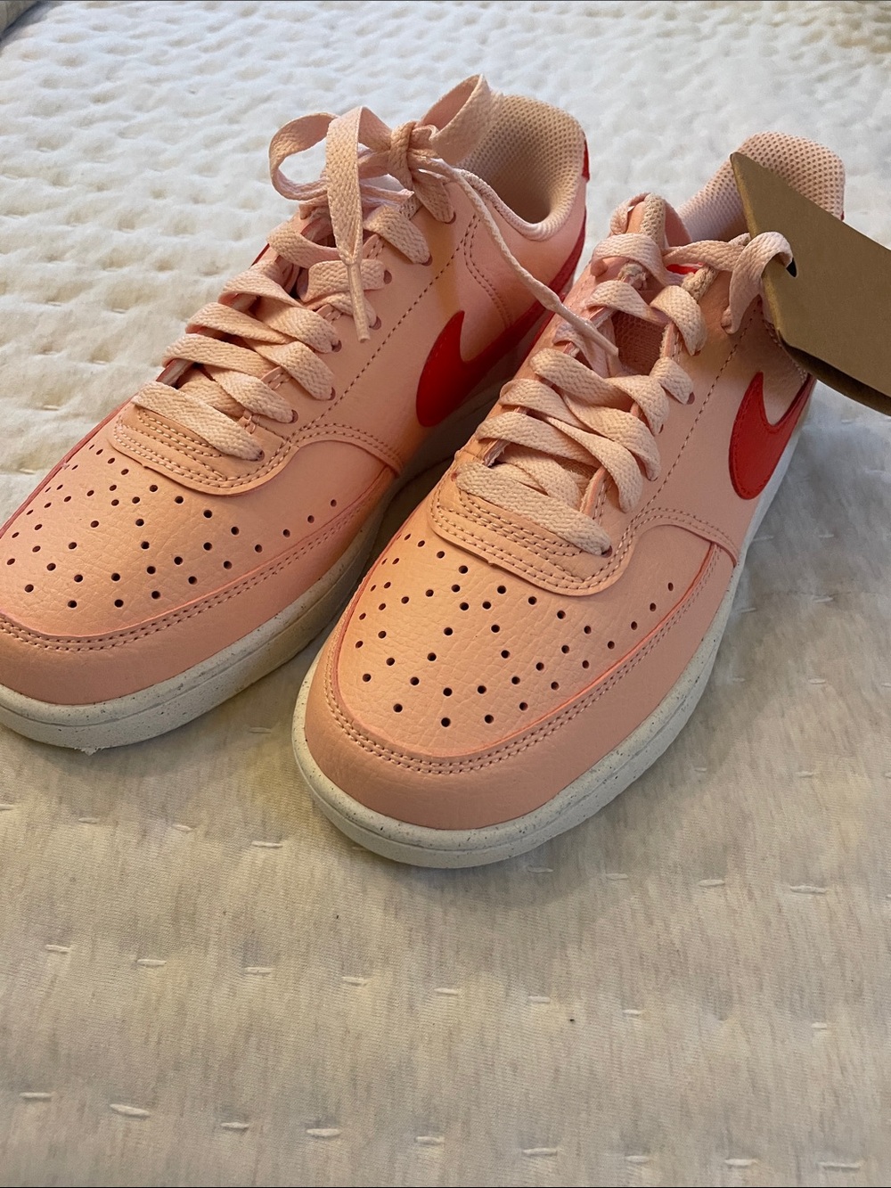 Nike Women's Peach-Pink Low-Top Sneakers with Red Swoosh